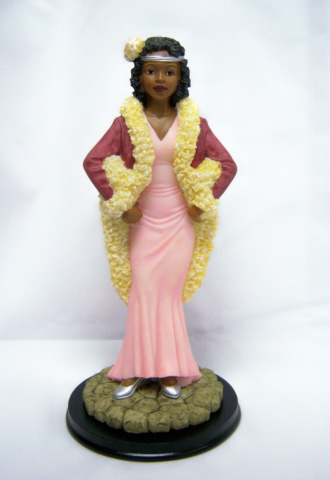 Joint is Jumping Ebony / Black Lady Figurine - United Treasures U17181