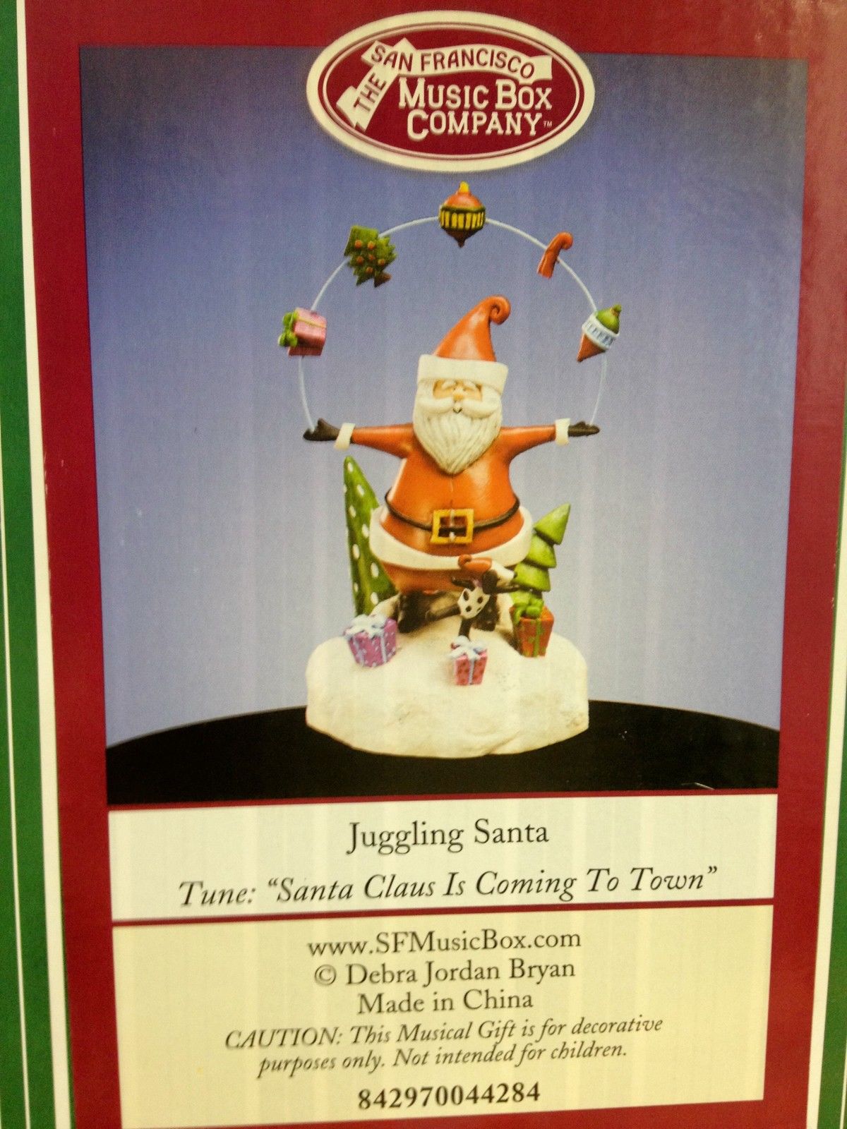 Juggling Santa Christmas Figurine Musical - San Francisco Music Box