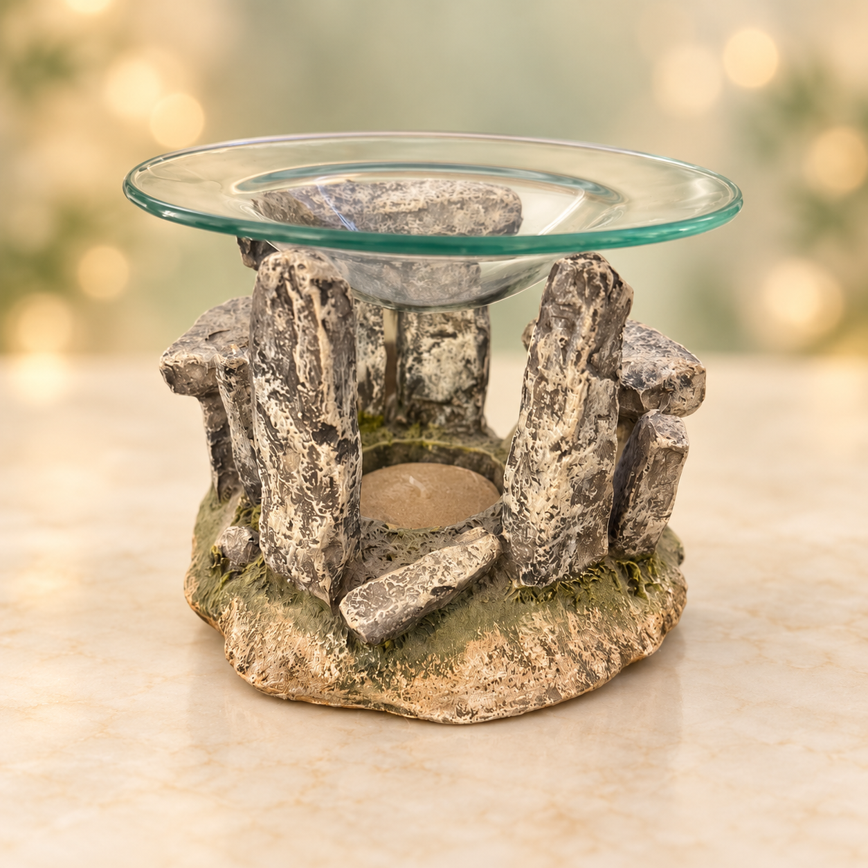 Stonehenge fragrance oil burner on elegant sage and cream background